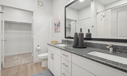 Offering Style & Functionality bathroom with modern finishes and ample counter-space